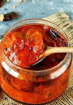 Home made Organic Lemon Pickle (Nimbu ka Achar)is a traditional Indian condiment made with lemons (or limes), ground spices, salt and an optional ingredient – oil. Many Indian homes make pickles during summer that usually last for an year. Pickles are eaten as a side in an Indian meal and is believed to aid digestion when eaten in small quantities DM for orders min qty 250gms 175rs